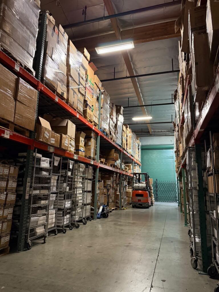 WirelessTree warehouse aisle with pallet racking and inventory